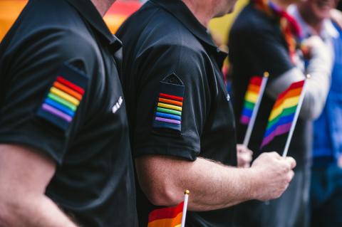Our staff flying the rainbow flags at Pride